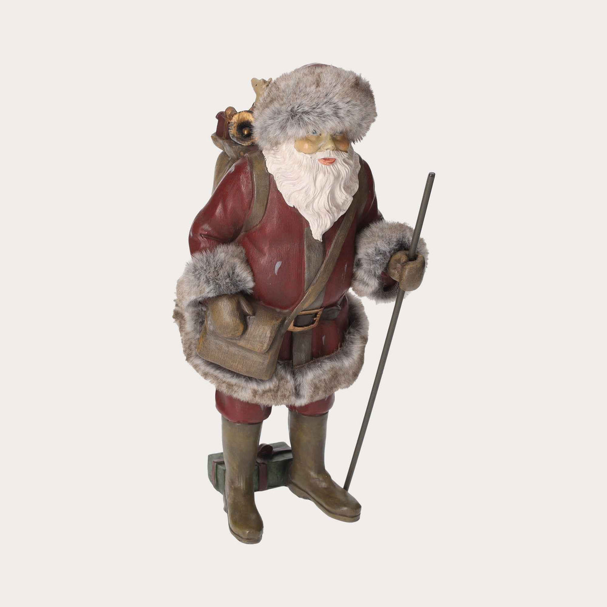 Figurine en résine du Père Noël avec sac de cadeaux