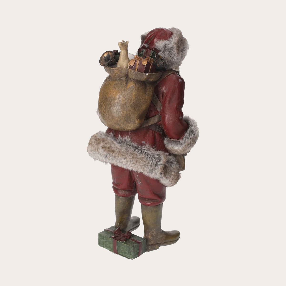 Figurine en résine du Père Noël avec sac de cadeaux
