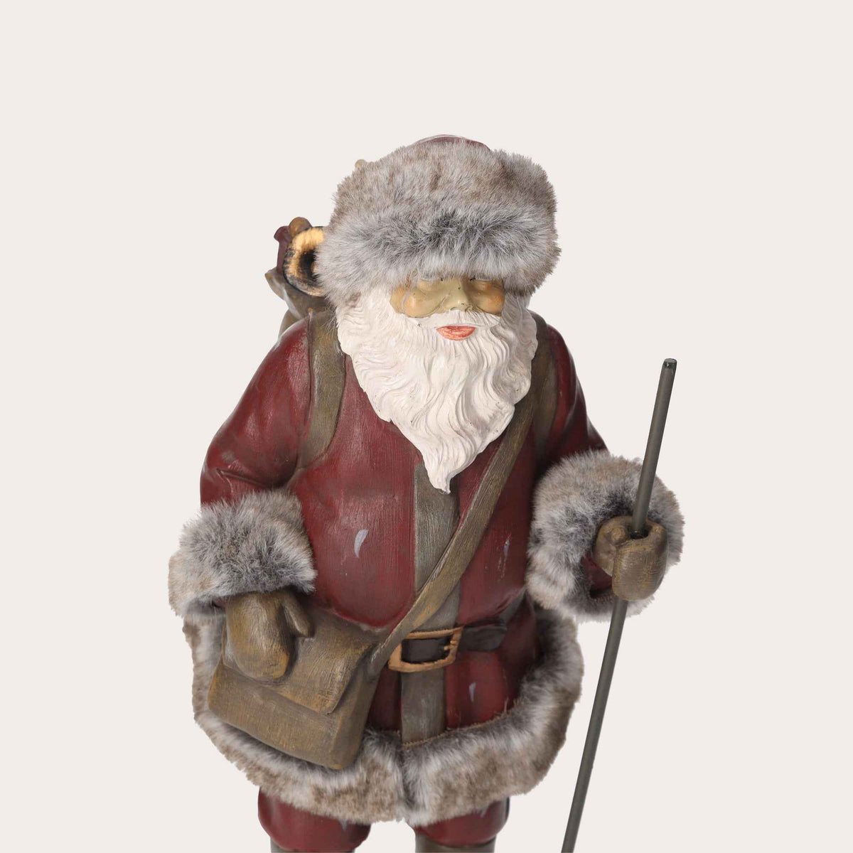 Figurine en résine du Père Noël avec sac de cadeaux
