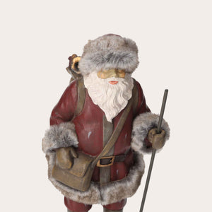 Figurine en résine du Père Noël avec sac de cadeaux