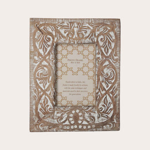 Carved Photo Frame with Elegant White Decorations