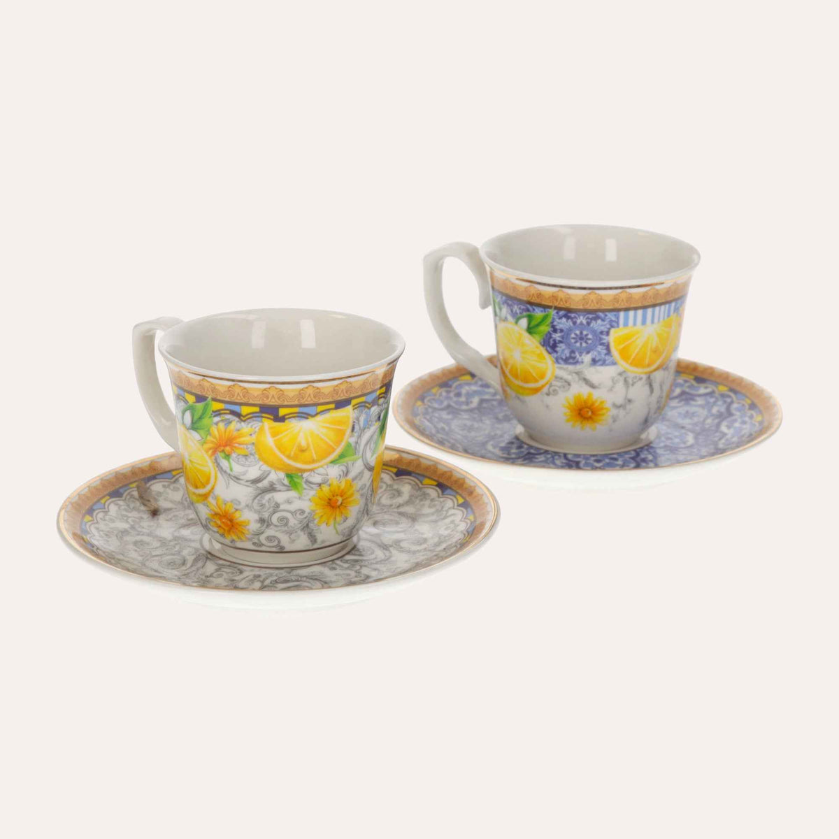 Par de tazas de cerámica con decoración de limón.