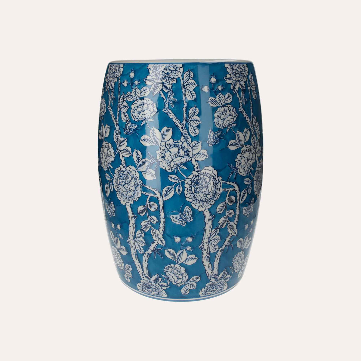 Porcelain pouf decorated with white flowers and butterflies