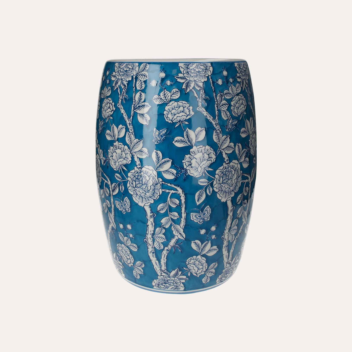 Porcelain pouf decorated with white flowers and butterflies