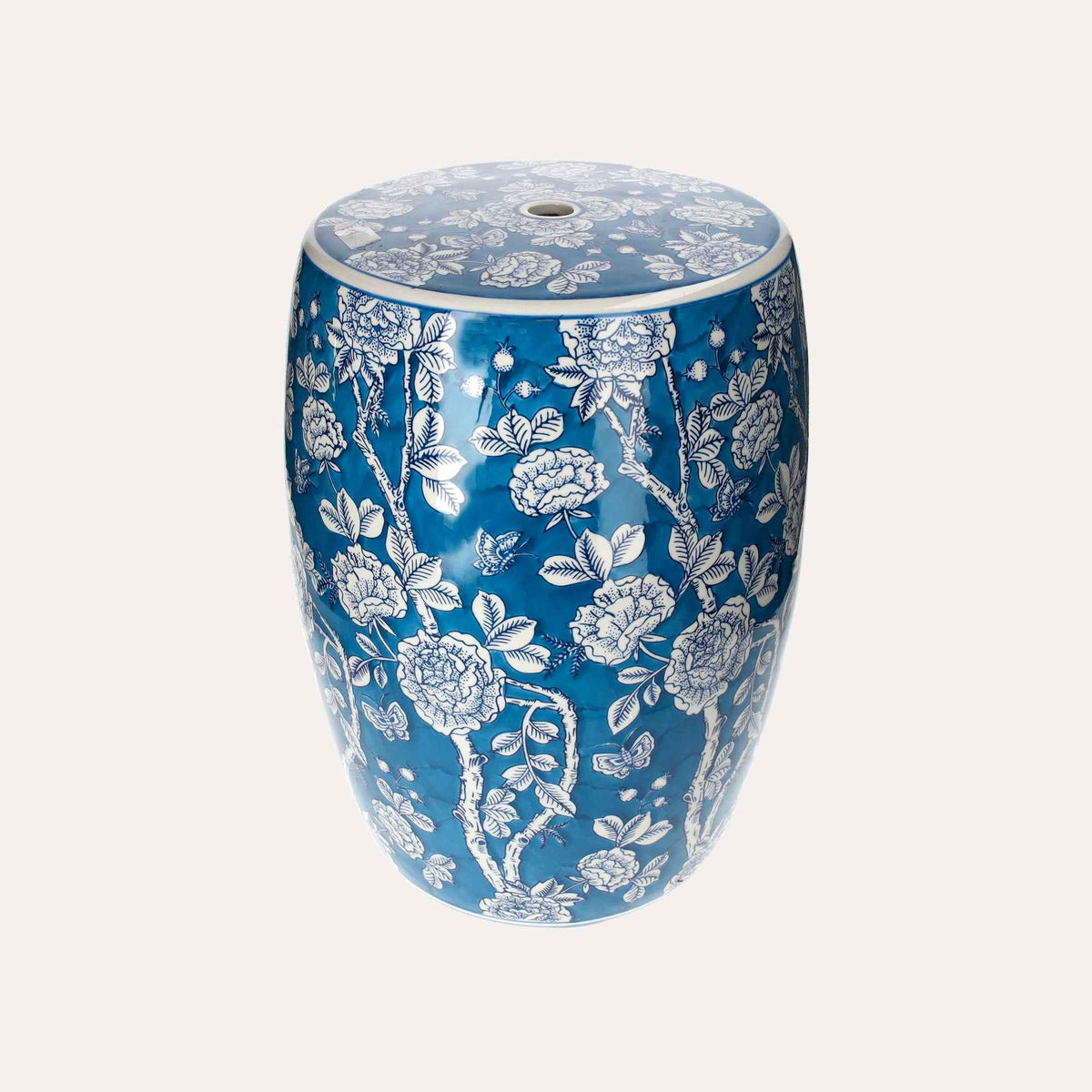 Porcelain pouf decorated with white flowers and butterflies