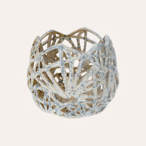 Decorative candle holder in pale blue ceramic