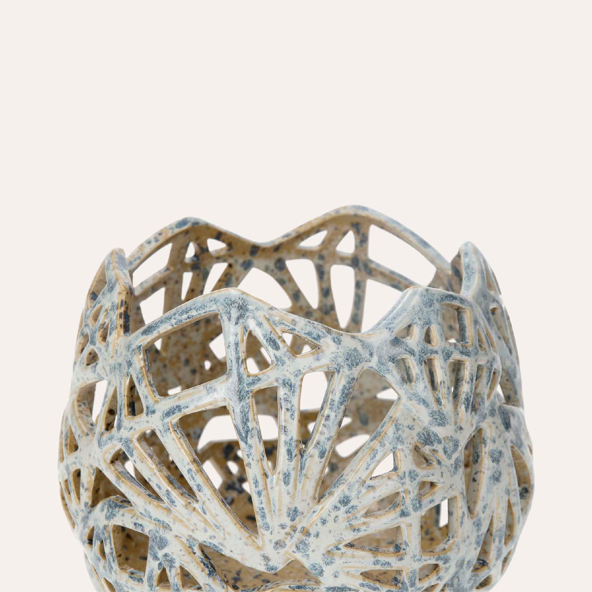 Decorative candle holder in pale blue ceramic