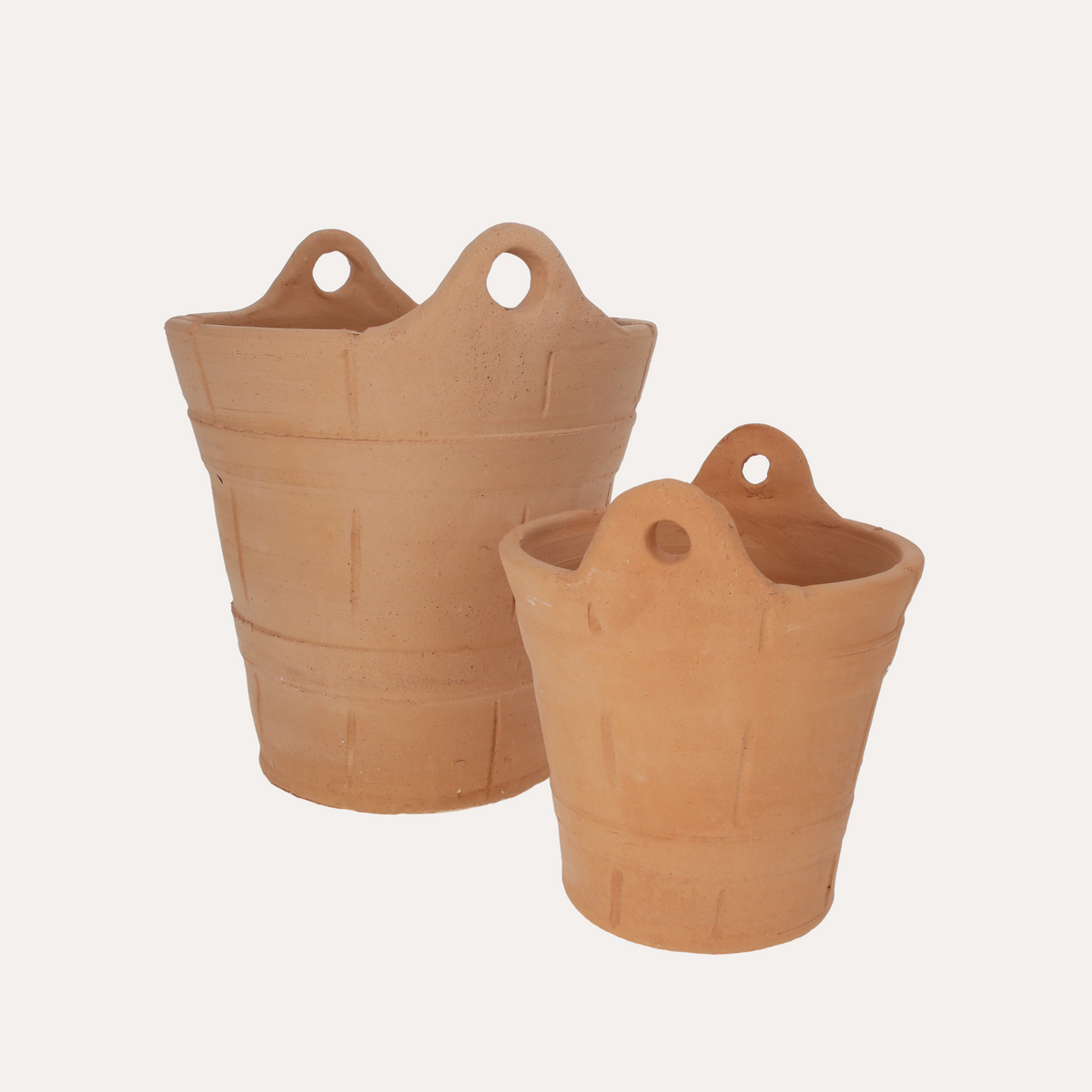 Juego de 2 cestas de terracota Al. 19/27 cm
