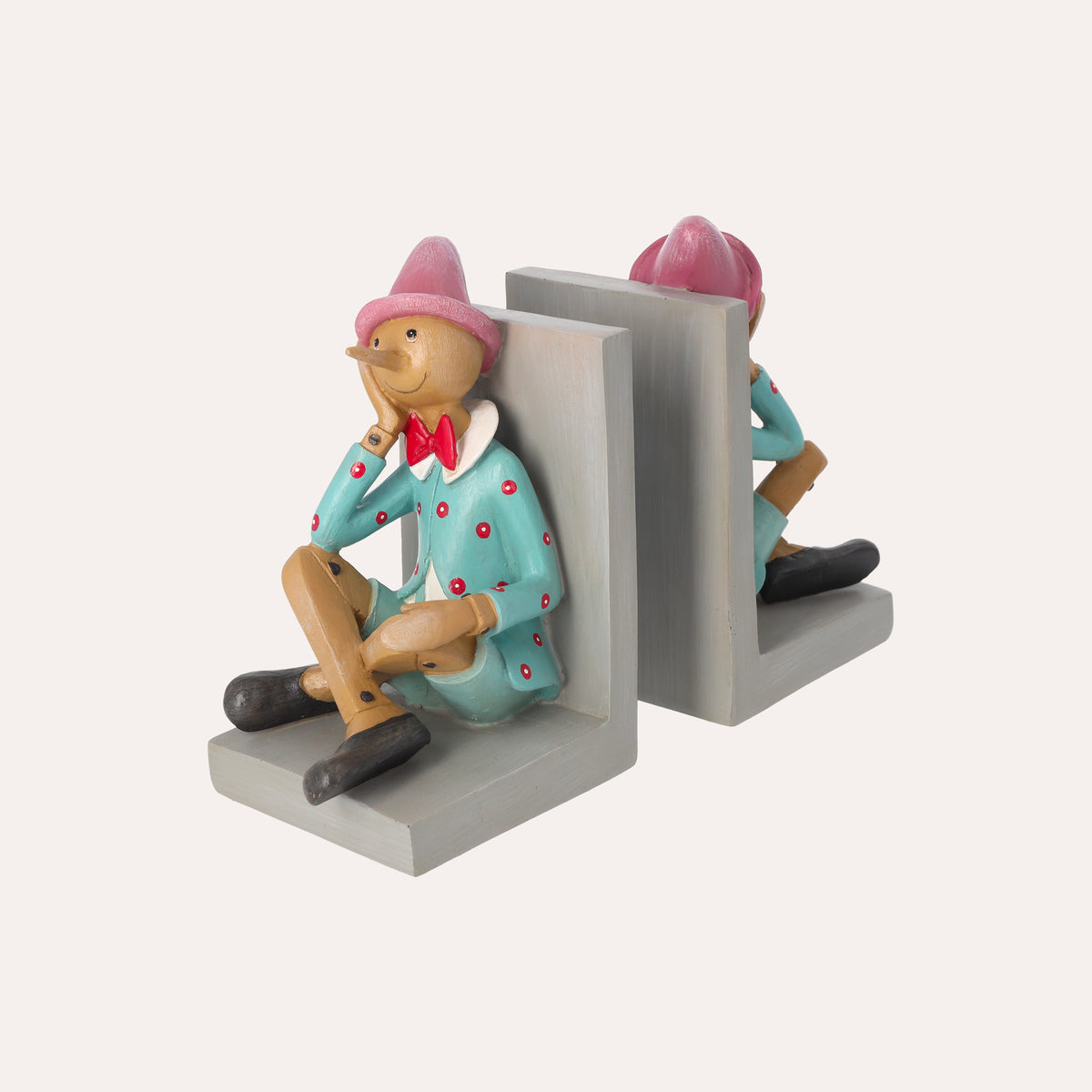 Coppia di Fermalibri con Pinocchio in Resina H. 18 cm